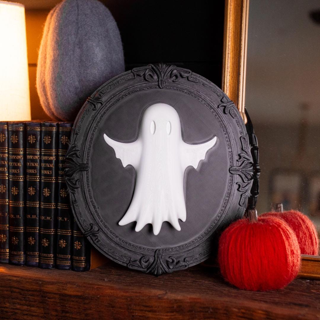 Ghost Frame Cute Gothic Halloween Ghost 3d printed gothic halloween ghost frame cute spooky ornament haunted house wall hanging creepy home decor eerie october decoration vintage holiday sculpture rustic gothic interior display whimsical ghostly accent macabre seasonal centerpiece quirky haunted aesthetic phantom halloween art ethereal spirit wall figure chilling gothic style festive night decor fantasy apparition ornament